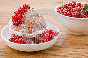 cake is decorated with berries and red currant in a bowl/cake is decorated with berries and red currant in a white bowl