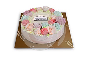 Cake is decorated with colorful roses to celebrate Christmas and New Year