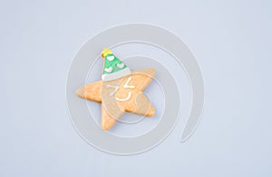 cake decoration or star shape christmas cookies on background.