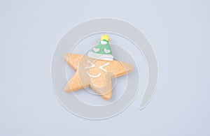 cake decoration or star shape christmas cookies on background.