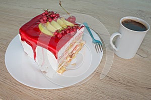 Cake on dish with currant in a relaxing time. Piece cake on white plate with fork