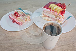 Cake on dish with currant in a relaxing time. Piece cake on white plate with fork