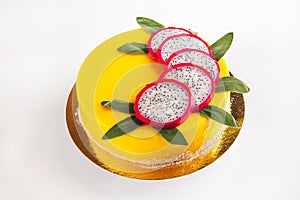 Cake with fruit, chocolate, flowers is isolated on a white background close-up and copy space. In Russian the inscription `Happy B