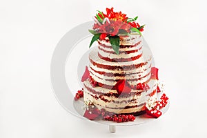 Cake with fruit, chocolate, flowers is isolated on a white background close-up and copy space. In Russian the inscription `Happy B