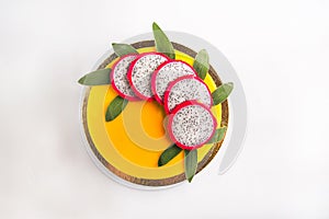 Cake with fruit, chocolate, flowers is isolated on a white background close-up and copy space. In Russian the inscription `Happy B