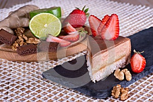 Cake and ingredients on a wooden table