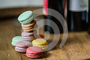 Cake macaron or macaroon on turquoise background from above, col