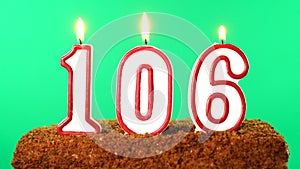 Cake with the number 106 lighted candle. Chroma key. Green Screen. Isolated