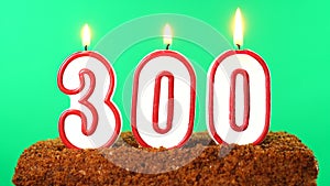 Cake with the number 300 lighted candle. Chroma key. Green Screen. Isolated