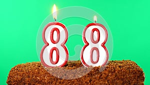 Cake with the number 88 lighted candle. Chroma key. Green Screen. Isolated