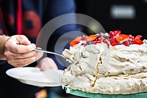 Cake Pavlova with cream and fresh fruits