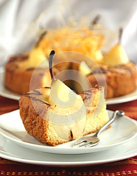 Cake with pears with spun sugar strands photo