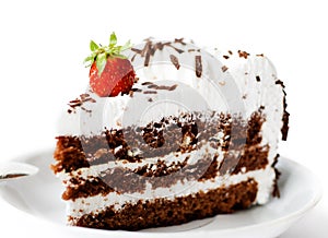 Cake on plate with strawberry