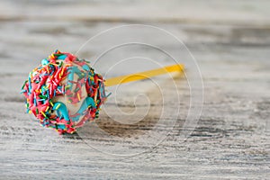 Cake pop with frosting.