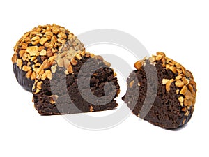 Cake rum truffle two balls with chopped nuts isolated on the white background