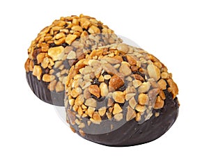 Cake rum truffle two balls with chopped nuts isolated on the white background