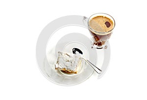 Cake on a saucer and coffee