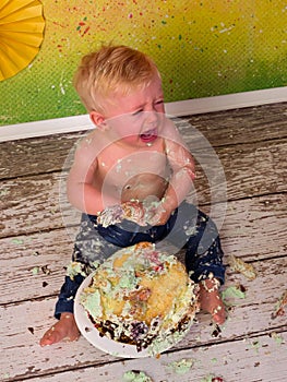 Cake smash boy crying