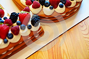cake with berries in the form of the number. photo