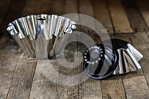 Cake tins on wood table