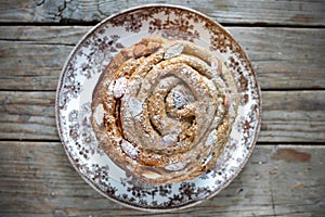 Cake topping with almonds and cream, panettone italian sweet bread