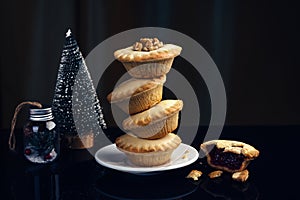 Cake tower, shortbread dough, jam cherry filling, spruce and New Year decorations