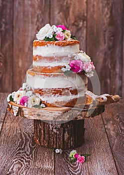 Cake on a wooden cut stand