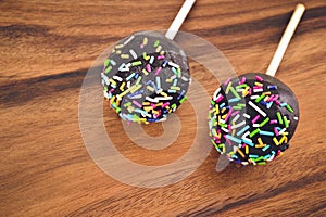 Cakepops in chocolate glaze with colored decoration