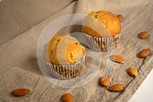 Cakes with almonds on the table