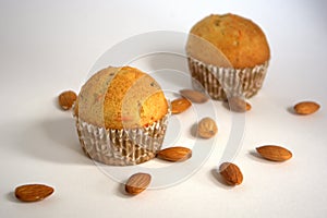 Cakes with almonds on the table