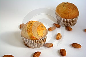 Cakes with almonds on the table