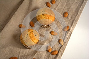 Cakes with almonds on the table
