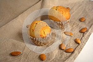 Cakes with almonds on the table