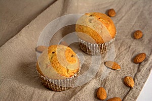 Cakes with almonds on the table