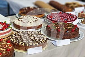 Cakes on display at the farmers market stall