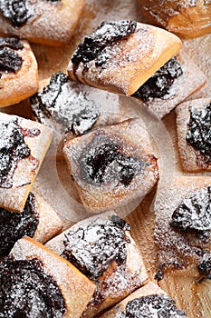 Cakes with jam and icing sugar