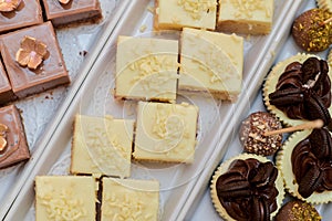 Cakes with white chocolate and caramel and chocolate balls