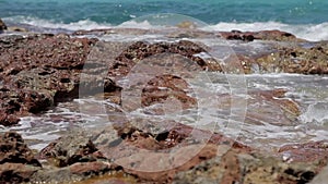 Cala conta Ibiza beach, Wet turquoise water rocks in ibiza