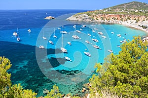 Cala d`Hort bay with beach and turquoise water on Ibiza photo