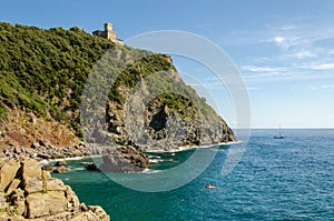 Cala Del Leone, Castel Sonnino Italy. Coast castle on the rock with the sea.