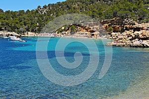 Cala Salada beach in San Antonio, in Ibiza Island, Spain