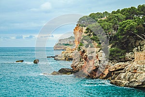 Cala Santanyi - beautiful scenery with houses on cliffs in Santanyi, Mallorca, Spain