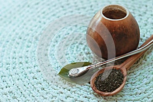 Calabash with mate tea on knitted mat