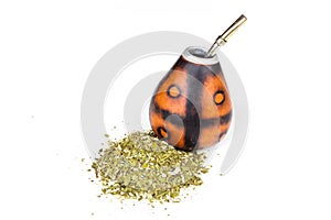 Calabash for yerba mate with its bombilla with a lot of yerba mate on a white background