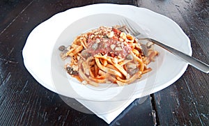 Calabrian pasta with capers, anchovies, olives and taralli