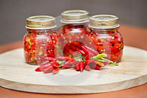 Calabrian peppers in oil hot pepper very hot chili photo