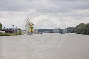 Calarasi industrial dock and barge on Danube