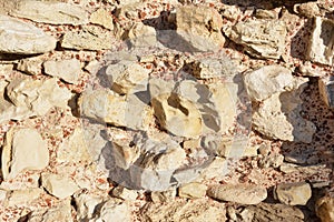 Calcareous stones and red bricks texture