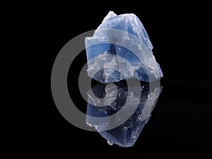 Calcite blue close-up. Black background. Macro image. photo