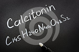 Calcitonin hormone and handwritten molecular formula photo